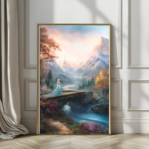 May include: A framed art print shows a woman in a blue gown on a stone bridge. The landscape includes a river, mountains, and a castle, with autumn foliage. The print is in a gold frame.