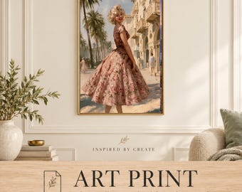 May include: A framed wall art print featuring a blonde person in a floral tea-length dress standing on a sunny street lined with palm trees and buildings. The artwork displays a vintage-inspired scene with warm tones and a soft, painterly aesthetic.