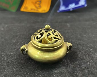 Quemador de incienso vintage de cobre nepalí con diseño de templo de elefantes