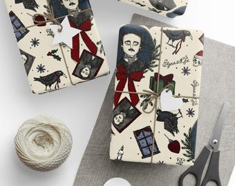 May include: Gift-wrapped presents with a cream-colored paper featuring illustrations of Edgar Allan Poe, ravens, and other gothic elements. Each package is tied with twine and adorned with a heart-shaped tag. A spool of twine and scissors are also visible.