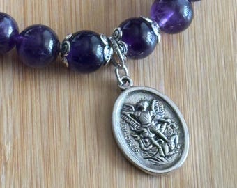 Amethyst Saint Michael, Guardian Angel charm bracelet, 10mm beaded gemstone elastic bracelet. Approx. 7.5 inches.