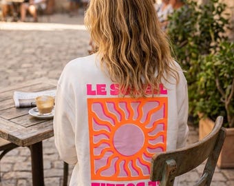 Felpa alla moda con la scritta "LE SOLEIL"