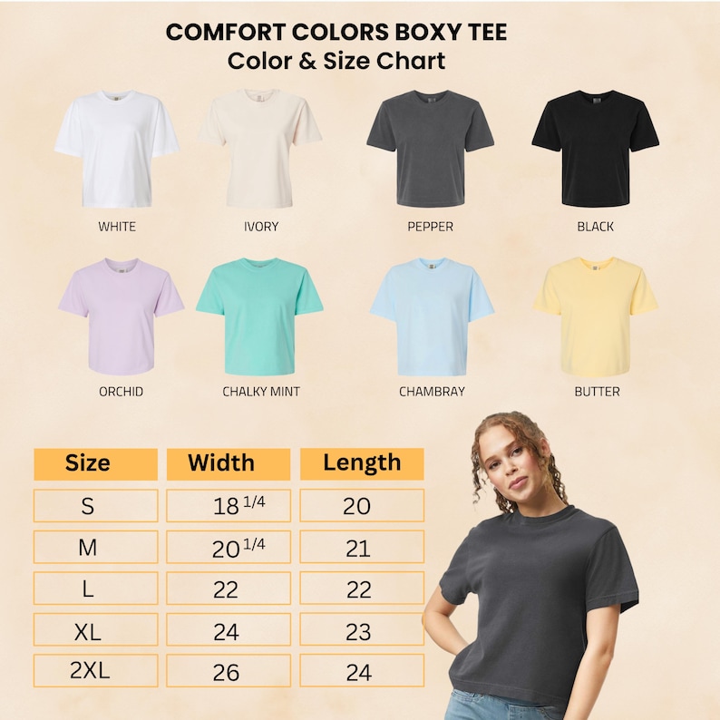 K&ouml;nnte beinhalten: Eine Farb- und Gr&ouml;&szlig;entabelle f&uuml;r Comfort Colors Boxy-T-Shirts. Die Tabelle zeigt verschiedene T-Shirt-Farben, darunter Wei&szlig;, Elfenbein, Pfeffer und Schwarz. Die Gr&ouml;&szlig;entabelle zeigt die Ma&szlig;e f&uuml;r die Gr&ouml;&szlig;en S bis 2XL, mit einer Breite von 46,36 bis 66,04 cm und einer L&auml;nge von 50,8 bis 60,96 cm.
