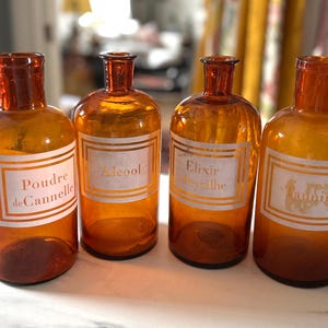 4 Vintage French  Glass Apothecary Bottles