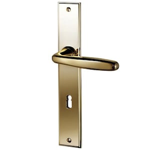 May include: A polished gold-colored door handle with a rectangular backplate and a curved lever. The handle features a keyhole and is designed for interior doors. The hardware is made of metal and has a shiny finish.