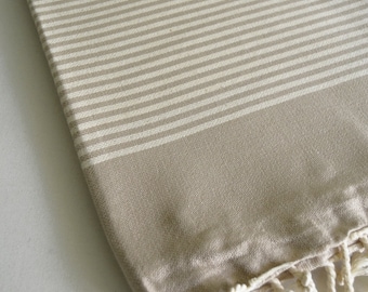 Classic Turkish beach and bath towel, 100% cotton, machine washable, 39x70 inches.