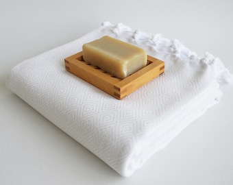 Pure White Turkish Beach-Bath Towels dry quickly and they're medium thickness multi-functional Towels