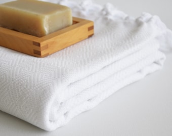 White Turkish Beach-Bath Towels dry quickly and they're medium thickness multi-functional Towels