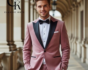 May include: A dusty rose velvet suit with a black satin lapel and a black bow tie. The suit includes a two-button jacket and matching pants. The shirt is white with black buttons. The logo "CK CLASSIC KUTS" is in the upper left corner.
