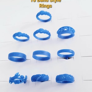 May include: Ten blue wax ring models arranged in a grid, featuring various band styles including twisted, smooth, and floral patterns. The text 10 Band Style Rings is displayed at the top. These items are designed for jewelry casting processes.
