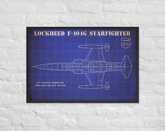 May include: A framed blueprint of a Lockheed F-104G Starfighter aircraft. The blueprint is white on a blue background, with text that reads "LOCKHEED F-104G STARFIGHTER" and "476th Tactical Fighter Sqn, Phan Rang Air Base Vietnam."