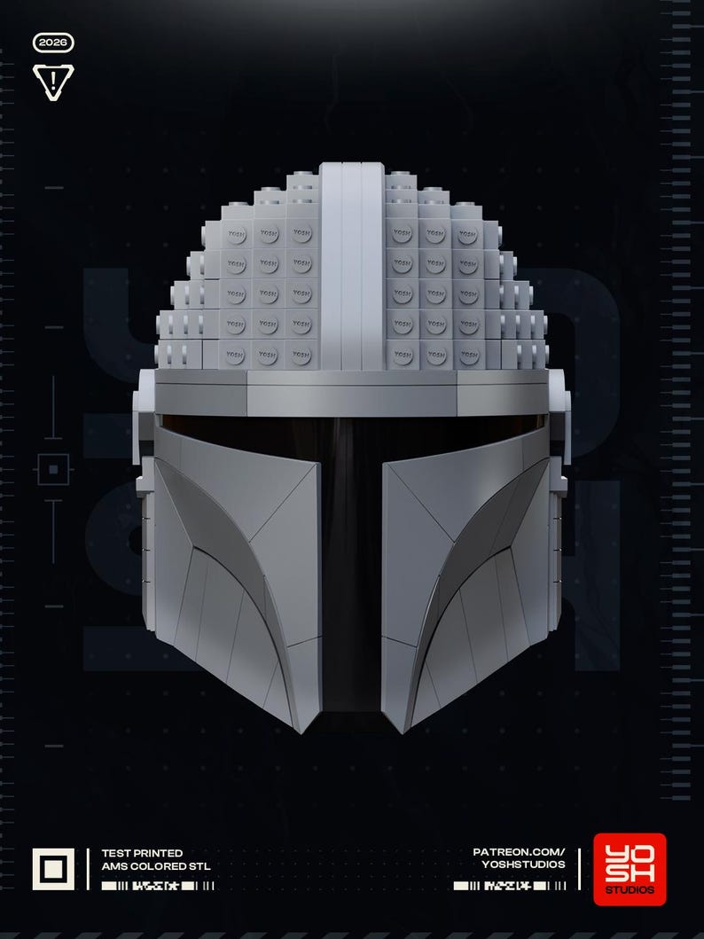 May include: A gray Mandalorian helmet constructed from interlocking blocks, with a dark visor. The helmet's design is angular and geometric, with a textured surface. The image includes the text "TEST PRINTED AMS COLORED STL" and "PATREON.COM/YOSHSTUDIOS".