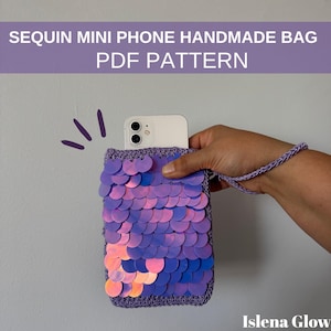 May include: A handmade sequin mini phone bag with a purple and pink gradient design. The bag is made with a crochet border and a braided wrist strap. The text "SEQUIN MINI PHONE HANDMADE BAG PDF PATTERN" is at the top.
