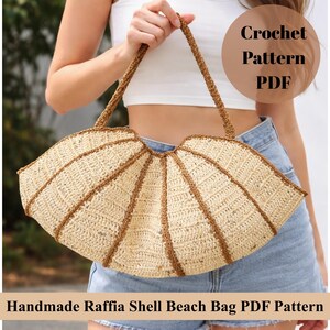 May include: A handmade raffia shell beach bag with a crochet pattern. The bag is beige with brown trim and handles. The text "Crochet Pattern PDF" is in a circle on the upper right. The text "Handmade Raffia Shell Beach Bag PDF Pattern" is at the bottom.