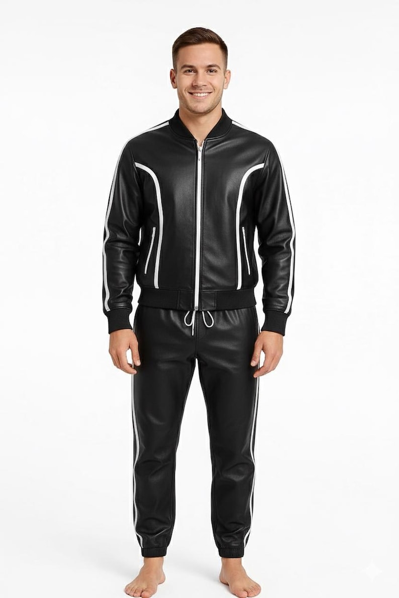 Peut inclure: Ensemble de surv&ecirc;tement en cuir noir avec des rayures blanches. La veste zipp&eacute;e pr&eacute;sente des bordures blanches. Le pantalon assorti a une taille &agrave; cordon et des rayures blanches. Un design moderne et &eacute;l&eacute;gant.