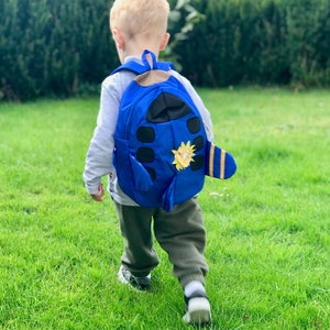 3 colour option Airplane backpack for kids on the go, entertains and keeps kids happy during travels, restaurant visits and more ....