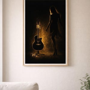 May include: A framed art print featuring a black acoustic guitar with golden highlights, a silhouette of a person, and golden sparkles against a dark background. The artwork is displayed in a room with a neutral color palette.