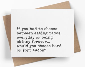 May include: A white rectangular greeting card with black typewriter-style text that reads: if you had to choose between eating tacos everyday or being skinny forever... would you choose hard or soft tacos? The card rests on a brown envelope.