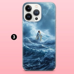 May include: Clear phone case featuring a digital art print of a figure in white robes standing in turbulent blue ocean waves under a cloudy sky. The case has a clear border and a pink background.