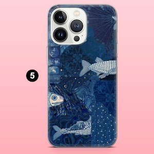 May include: A phone case with a blue and white fish design. The case features a collage of blue patterns and textures, with several white fish illustrations. The design is set against a light pink background.