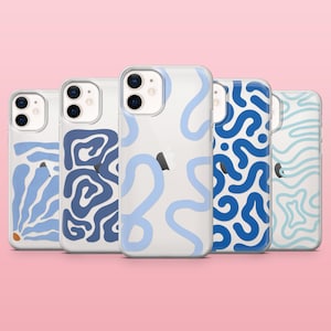 May include: Five clear phone cases with abstract designs in shades of blue. The cases feature various patterns, including wavy lines and organic shapes, set against a pink background. The cases are designed to fit a smartphone.