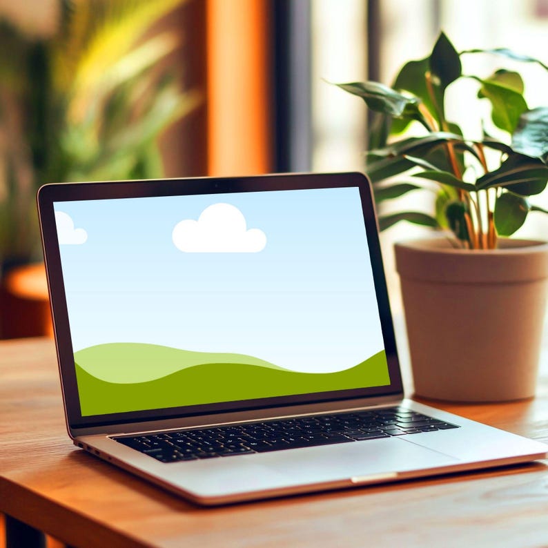 May include: A silver laptop with a black keyboard on a wooden table. The screen shows a landscape with a blue sky, white clouds, and green hills. A potted plant is to the right of the laptop.