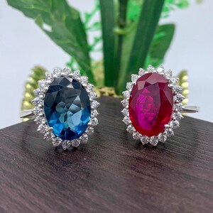 Elegant sterling silver ruby halo ring and blue sapphire halo ring.
