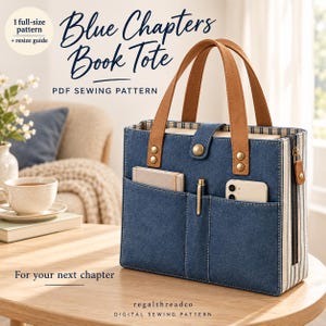 May include: A blue denim book tote with tan faux leather handles, a snap closure, and exterior pockets containing a notebook, pen, and smartphone. The bag features side panels with blue and white stripes and text reading Blue Chapters Book Tote.