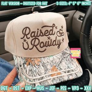 May include: A beige baseball cap with a camouflage brim featuring the embroidered brown text "Raised & Rowdy" with star and cowboy hat icons. The design includes text stating "FLAT VERSION - DIGITIZED FOR HAT" and "3 SIZES: 4" 5" 6" INCHES".