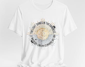 The Light Shines In The Darkness Unisex Jersey Short Sleeve Tee