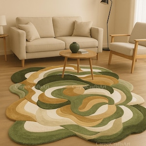 May include: A modern living room featuring a large, abstract-shaped rug in shades of green, beige, and cream. The rug is the focal point, complemented by a beige sofa, wooden coffee table, and a floor lamp. The room has a minimalist design.