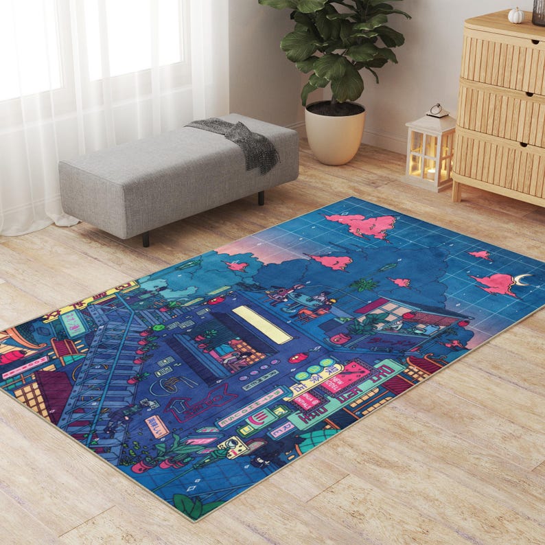 May include: A rectangular area rug with a vibrant, detailed illustration of a cityscape at night. The rug features a blue background with pink accents, depicting buildings, lights, and a grid-like pattern. The design has an anime aesthetic.