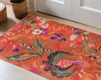 Boho bloemen vloerkleed, oranje botanische woonkamermat, eclectisch statement decor