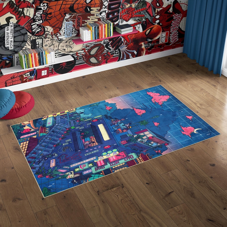 May include: A rectangular area rug with a vibrant cityscape design in shades of blue, purple, and pink. The rug features buildings, streets, and neon signs, creating a modern, artistic aesthetic. The rug is placed on a wooden floor.