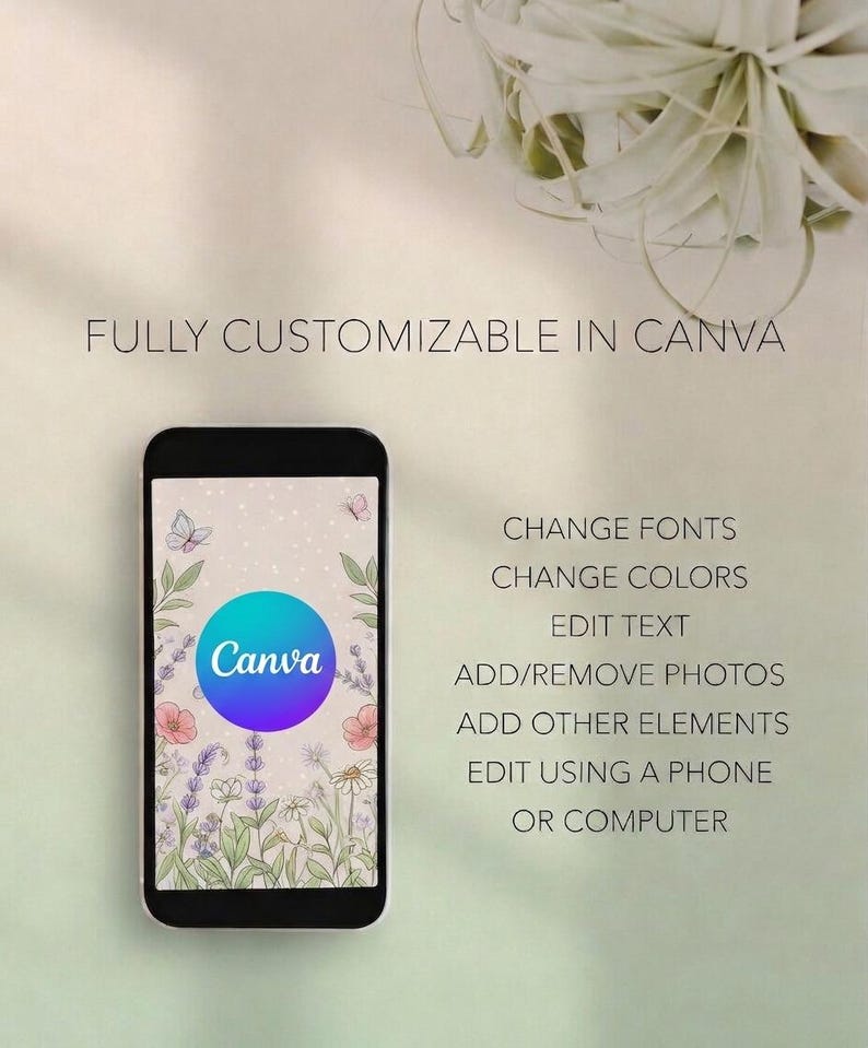 May include: A black smartphone displays a Canva design with a floral background and a blue and purple circle logo. Text on the phone and in the image states: "FULLY CUSTOMIZABLE IN CANVA" and "CHANGE FONTS, CHANGE COLORS, EDIT TEXT, ADD/REMOVE PHOTOS, ADD OTHER ELEMENTS, EDIT USING A PHONE OR COMPUTER."