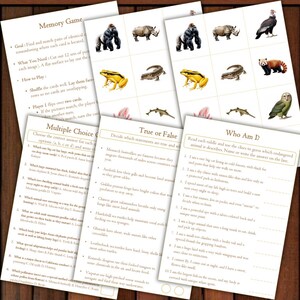 May include: Educational game cards featuring animal illustrations, including a gorilla, rhino, frog, and owl. The cards are designed for memory games, multiple-choice quizzes, and true/false questions, promoting learning about endangered species.