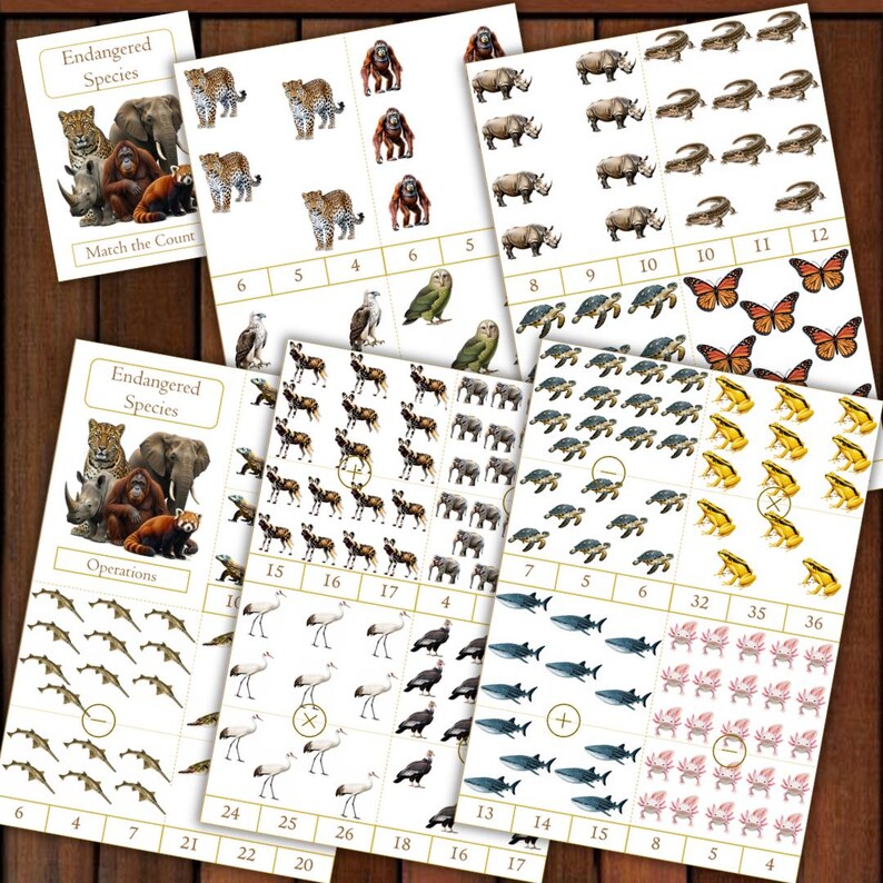 May include: Educational cards featuring endangered species, with illustrations of animals like leopards, rhinos, and orangutans. The cards include counting and basic math operations, with numbers and animal images for learning. The cards are arranged on a wooden surface.