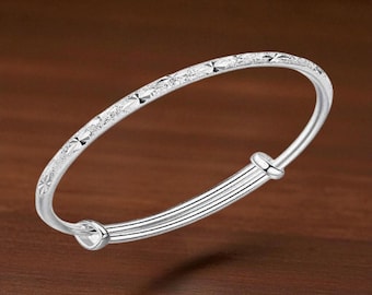 Pulsera ajustable de plata de ley 925 con diseño de espiral para mujer, ideal como regalo de dama de honor, aniversario o cumpleaños.