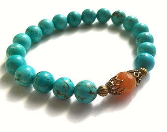 Turquoise Stretch Bracelet With Semi-Precious Magnesite Gemstones, A Faceted Carnelian Gemstone and Antiqued Brass Accents