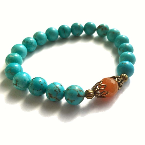 Turquoise Stretch Bracelet With Semi-Precious Magnesite Gemstones, A Faceted Carnelian Gemstone and Antiqued Brass Accents