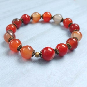 Antiqued Brass Stretch Beaded Bracelet, With Red Agate Gemstones in Yellow, Orange with Antiqued Brass Accents image 2