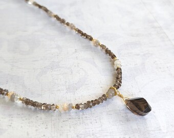 Faceted Smokey Quartz on a chain of Tiny Faceted Smoky Quartz and Shades of White & Yellow Quartz Gemstones with Gold Accents