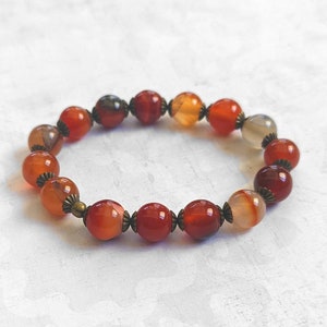 Antiqued Brass Stretch Beaded Bracelet, With Red Agate Gemstones in Yellow, Orange with Antiqued Brass Accents image 1