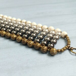 Gray & White Swarovski Crystal Pearl Beaded Cuff Bracelet With Antiqued Gold Plated Brass Accents