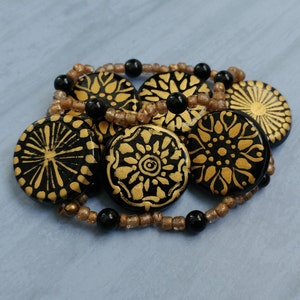 Hand Painted Black and Gold Glass Beaded Stretch Bracelet image 1