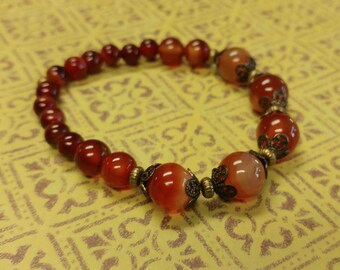 Red Agate Gemstone Stretch Bracelet With Gold-Plated Brass Accents