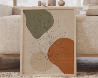 Könnte beinhalten: Ein gerahmter Kunstdruck mit einer schwarzen Strichzeichnung eines beblätterten Zweigs, zentriert über drei überlappenden organischen Formen in gedecktem Olivgrün, gebranntem Orange und Beige. Das Bild ist in einem hellen Holzrahmen gefasst.