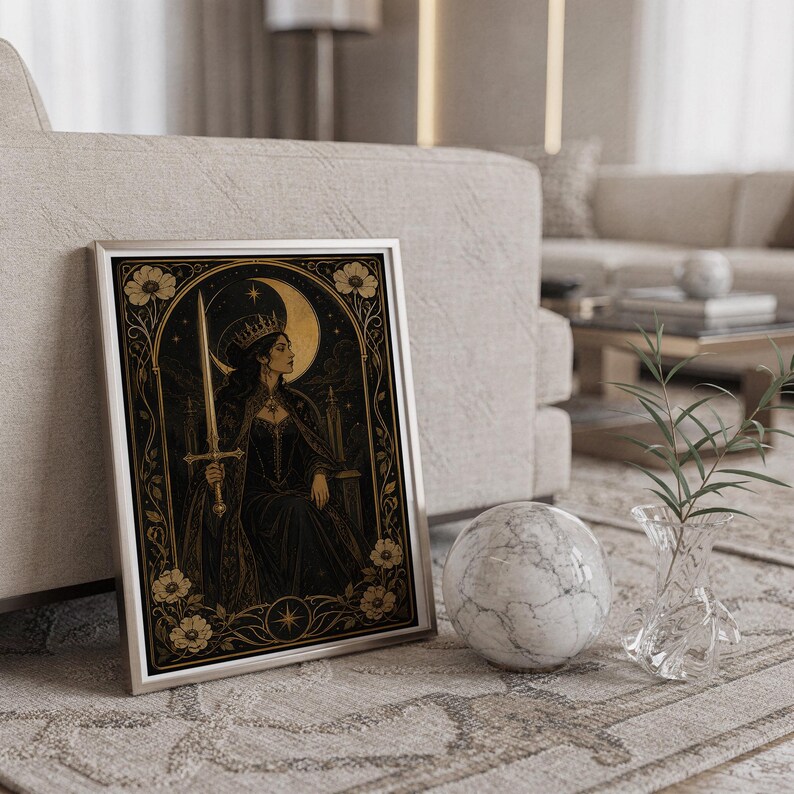 Gothic moon queen wall art print standing on a countertop in a modern white kitchen.