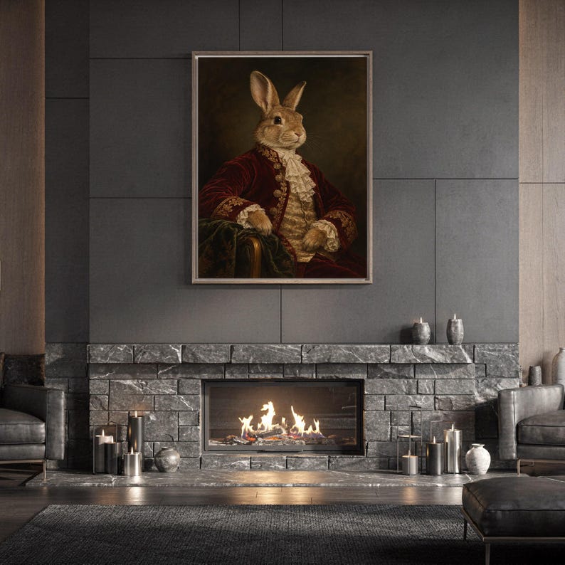 Regal rabbit portrait wall art print standing on a white kitchen counter beside potted herbs.