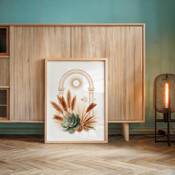 Sage green succulent and pampas grass botanical print leaning gracefully against a light oak sideboard cabinet with vertical slats, set on parquet floor with soft ambient lighting for modern minimalist home and gallery wall aesthetic.